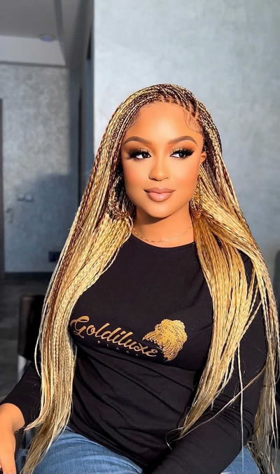 5 REASONS WHY A BRAIDED WIG SHOULD BE IN YOUR SUITCASE THIS SUMMER
